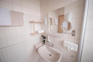 Koupelna v ubytování Gästehaus Maurer/Bader