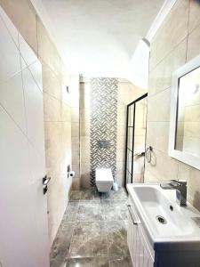 Koupelna v ubytování Premium Homes