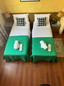 Postel nebo postele na pokoji v ubytování Hotel Raffaello Venice