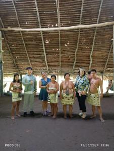 a group of people posing for a picture at Emanuel&Cavita in Iquitos