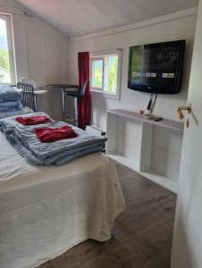Postel nebo postele na pokoji v ubytování Holiday Rooms + 37 fotografií