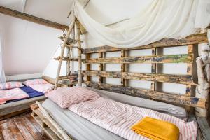 Postel nebo postele na pokoji v ubytování Tatra Magic