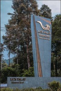 Ein Zertifikat, Auszeichnung, Logo oder anderes Dokument, das in der Unterkunft Luxtalay Khanom Hotel ausgestellt ist