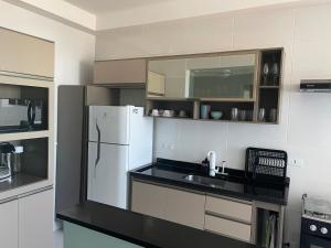 Η κουζίνα ή μικρή κουζίνα στο Apartamento frente mar KP