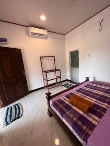 Voodi või voodid majutusasutuse Kurumba Lodge toas