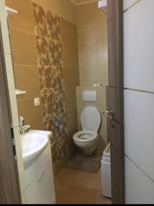 Koupelna v ubytování Charming apart next to the beach