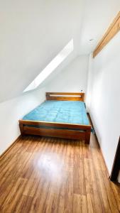 Postel nebo postele na pokoji v ubytování Orličky Apartments