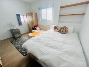 居家民宿-岩手二館客房内的一张或多张床位