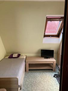 Posteľ alebo postele v izbe v ubytovaní Apartmány Morávka