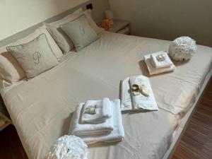 Postel nebo postele na pokoji v ubytování Il piccolo scrigno