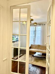 En eller flere senger på et rom på Guest House Tour Eiffel Paris