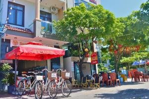 a group of bikes parked in front of a building at Sontra Sea Hotel in Danang