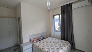 Voodi või voodid majutusasutuse Hotel Palm Gonio toas