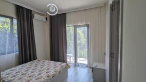 Voodi või voodid majutusasutuse Hotel Palm Gonio toas