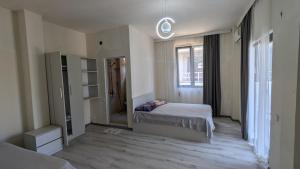 Voodi või voodid majutusasutuse Hotel Palm Gonio toas