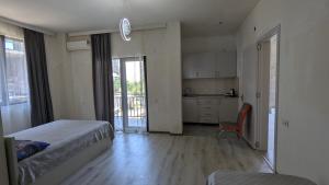 Voodi või voodid majutusasutuse Hotel Palm Gonio toas