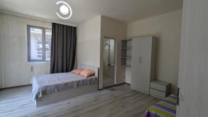Voodi või voodid majutusasutuse Hotel Palm Gonio toas