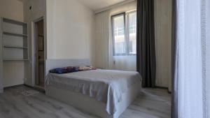 Voodi või voodid majutusasutuse Hotel Palm Gonio toas