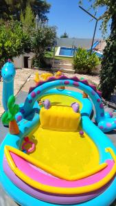 Ο χώρος παιχνιδιού για παιδιά στο Apartments Villa Velin