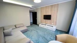 TV a/nebo společenská místnost v ubytování Complex Turistic Monaco