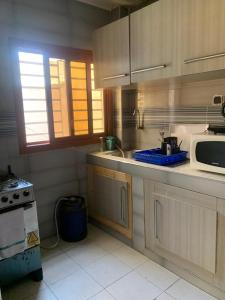 Kuchyň nebo kuchyňský kout v ubytování Residence Hadja 03