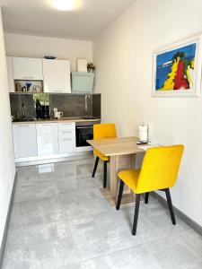 Kuchyňa alebo kuchynka v ubytovaní Apartment Gitara