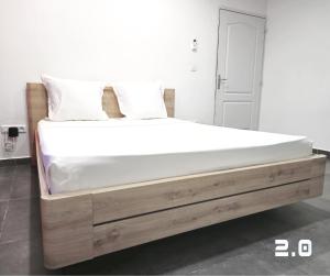 2 0 HÔTEL Vanille客房内的一张或多张床位