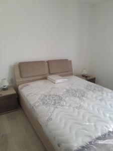 Postel nebo postele na pokoji v ubytování Alesia A