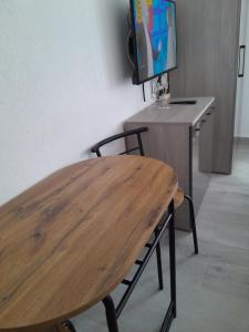 TV a/nebo společenská místnost v ubytování Alesia A