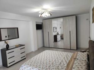 Postel nebo postele na pokoji v ubytování Casa Vacanza 6 posti letto - Grazia Home