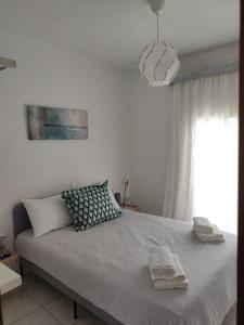 Posteľ alebo postele v izbe v ubytovaní Sun 'n Sand, dream it in Possidi
