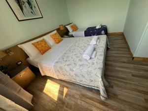 Postel nebo postele na pokoji v ubytování Hotel Raffaello Venice