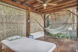 Фотография из галереи The Beach Bungalows Tamarindo- Adults Only в городе Тамариндо