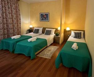 Postel nebo postele na pokoji v ubytování Hotel Raffaello Venice