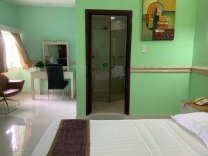Postel nebo postele na pokoji v ubytování Fortune 1127 - Central Hotel