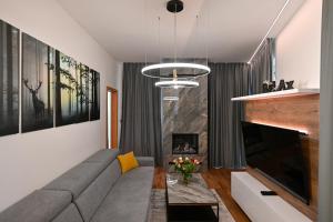 Posezení v ubytování Hotel Ovruč - rodinný apartmán 111