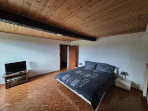Voodi või voodid majutusasutuse Chambre d'Hôtes R&S toas