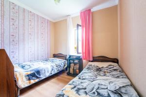 Voodi või voodid majutusasutuse Giorgi's Home toas