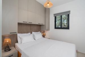 Postel nebo postele na pokoji v ubytování Mobile home Flora 2 + 24 fotografií