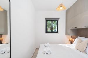 Postel nebo postele na pokoji v ubytování Mobile home Flora 2