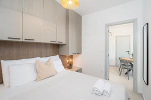 Postel nebo postele na pokoji v ubytování Mobile home Flora 2