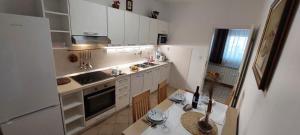 Kuchyň nebo kuchyňský kout v ubytování Apartment Kraljevic
