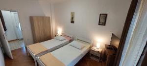 Postel nebo postele na pokoji v ubytování Apartment Kraljevic
