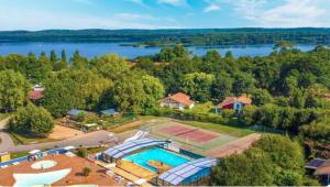 an aerial view of a resort with a swimming pool at L'Odyssée in Aureilhan