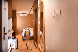 Postelja oz. postelje v sobi nastanitve Hotel Vistara