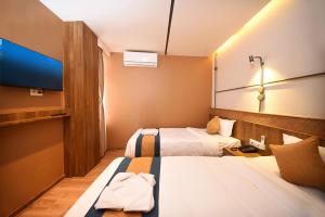 Postelja oz. postelje v sobi nastanitve Hotel Vistara