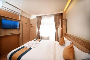 Postelja oz. postelje v sobi nastanitve Hotel Vistara