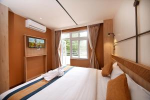 Postelja oz. postelje v sobi nastanitve Hotel Vistara
