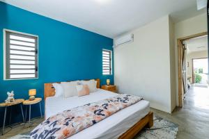Postel nebo postele na pokoji v ubytování Balnea Villa Sixty-Nine