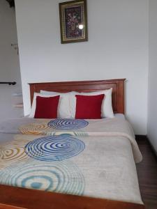 Postel nebo postele na pokoji v ubytování Kadalla Cottage